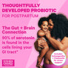 An image of a happy woman holding her baby. Thoughtfully developed probiotic for postpartum. The gut + Brain connection. 90% of serotonin is found in the cells lining your GI tract.
