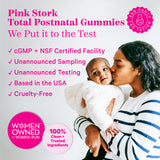 Pink Stork Total Postnatal Gummies. We put it to the test. cGMP + NSF certified facility. Unannounced sampling + testing. Based in the USA. Cruelty-free. 100% clean + trusted ingredients. Woman in striped sweater holding a baby and kissing it's cheek.