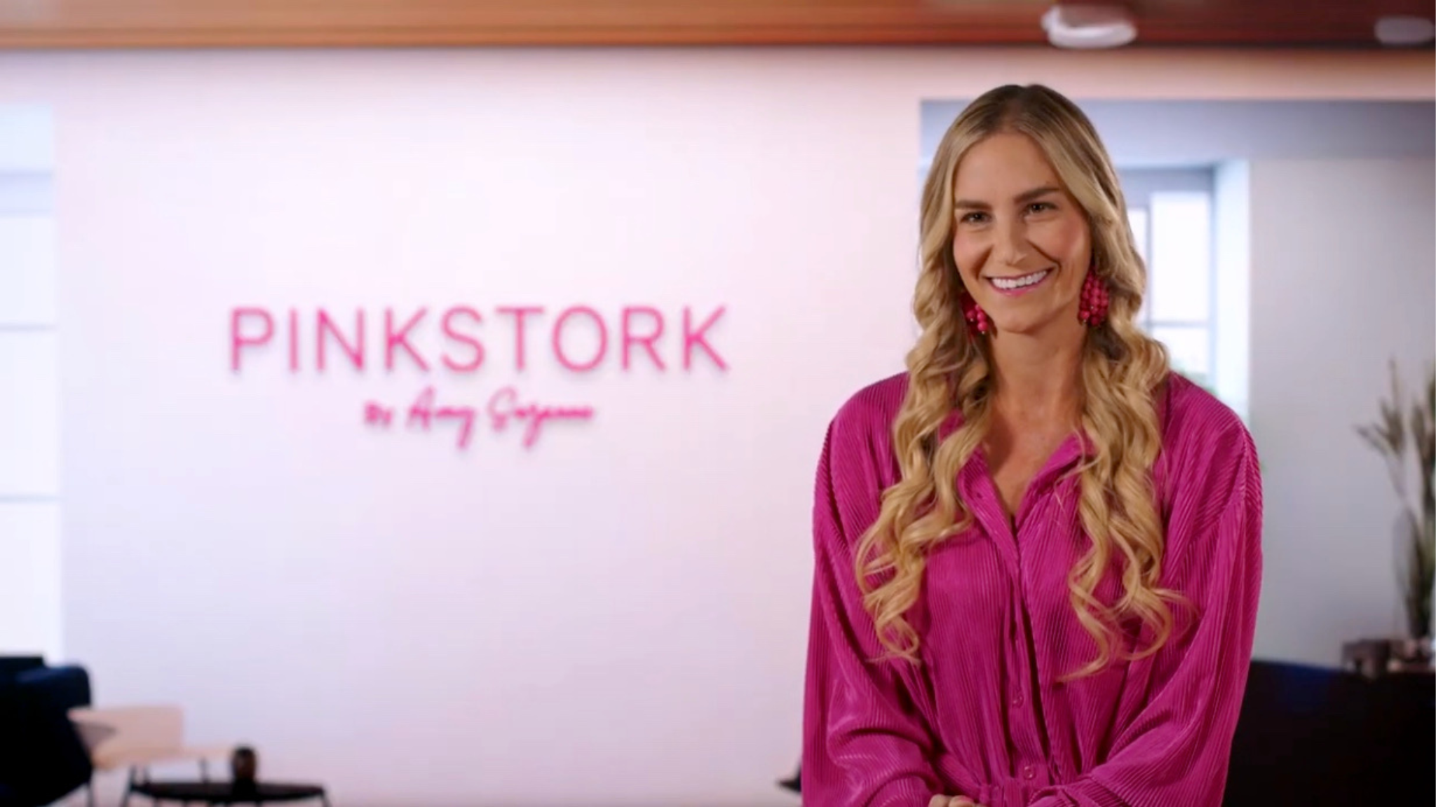 Amy Suzanne in the Pink Stork office