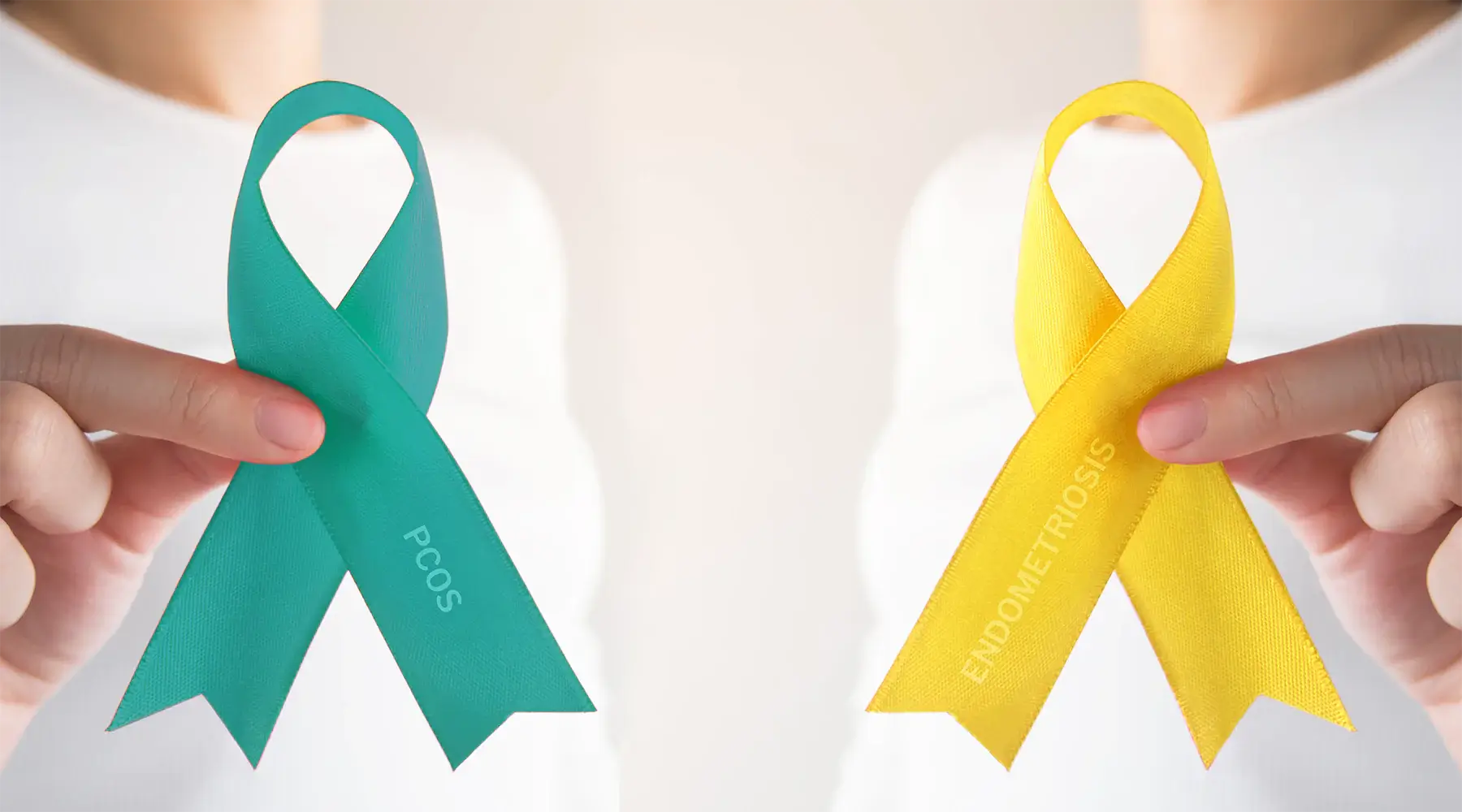 Hands holding teal PCOS awareness ribbon and yellow Endometriosis awareness ribbon side by side.