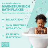 A happy baby in a bath. Magnesium Rich Bath Flakes.