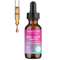 Bottle of Pink Stork Baby Sleep Drops with dropper on a white background