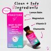 Bottle of Pink Stork Baby Sleep Drops leaning against a box of Pink Stork Baby Sleep Drops with arrows pointing to ingredient call outs. Clean + safe ingredients.