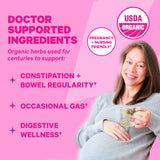 A pregnant woman drinks a clear mug of tea. Doctor Supported ingredients.