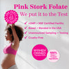 A pregnant woman stretching and looking peaceful. Pink Stork Folate.