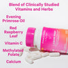 Bottle of Pink Stork Labor Prep laying on its side on a pile of capsules. Blend of clinically studied vitamins and herbs.