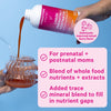 Hand pouring a bottle of Pink Stork Liquid Prenatal + Postnatal into a cup with a straw. Deliciously improved mixed berry flavor.