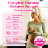 A pregnant woman drinking tear with a towel wrapped around her hair. Complete morning sickness support.