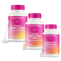 Three Pink Stork supplement bottles labeled Total Monolaurin, Total Prenatal + DHA, and Prenatal Probiotic, against a white background.