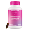 Pink Stork Sunflower Lecithin bottle with capsule leaning against it.