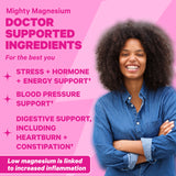 A smiling woman with her arms crossed. Mighty Magnesium, doctor supported ingredients for the best you. Stress + hormone + energy support. Blood Pressure support. Digestive support, including Heartburn + Constipation. Low magnesium is linked to increased inflammation.