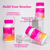 Group of Pink Stork general wellness products on or leaning against glass prisms. Build your routine.