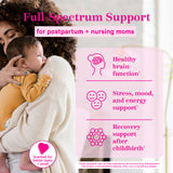 Woman holding her baby to her shoulder while looking over at him. Full-spectrum support for postpartum + nursing moms.