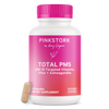 Pink Stork Total PMS bottle with capsule leaning against the bottom.